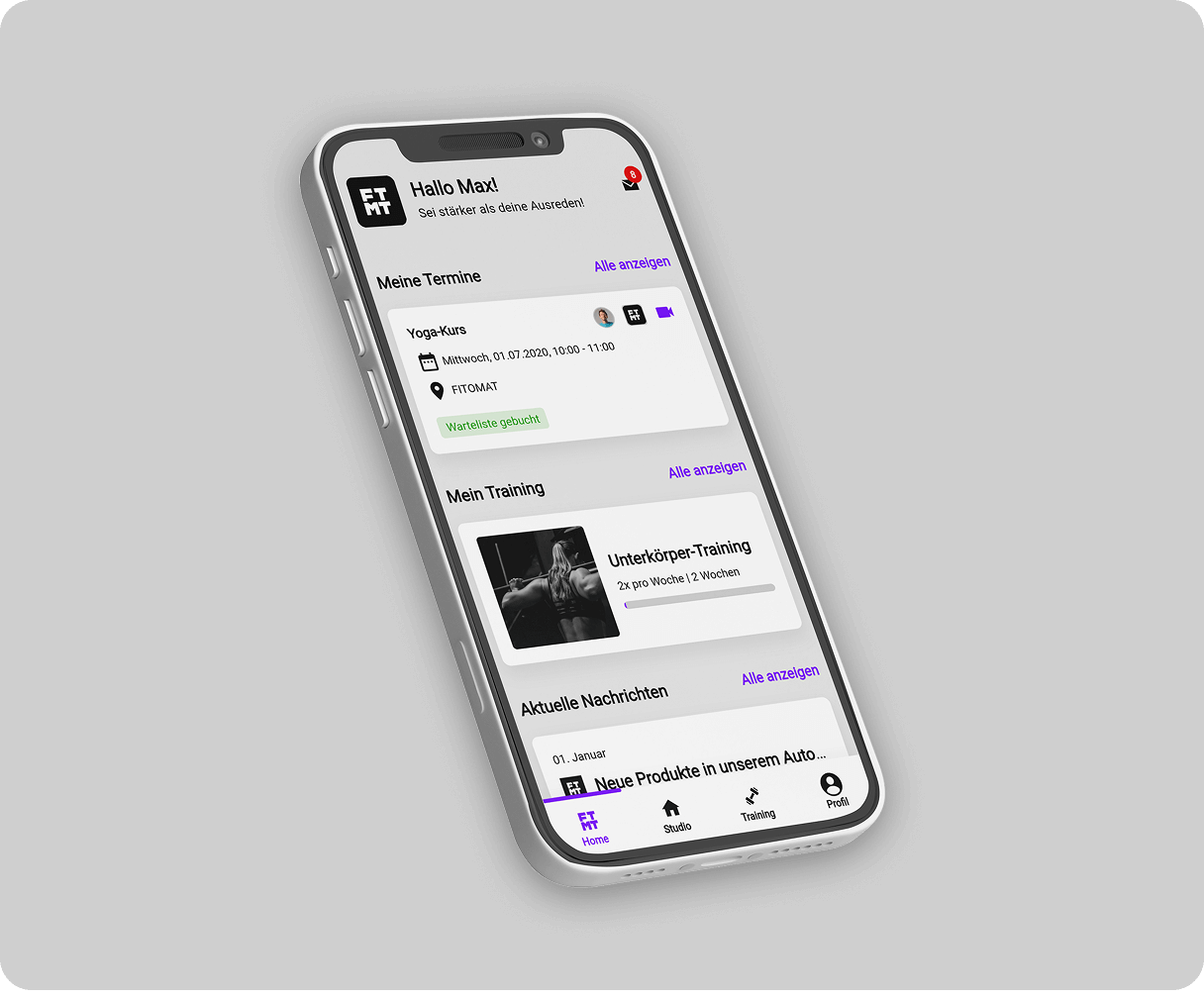 El smartphone con la aplicación FITOMAT abierta muestra un resumen del entrenamiento y la programación.